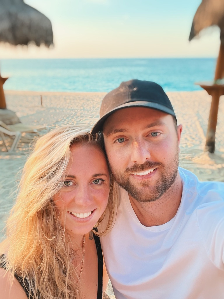 Myself and my partner on the beach at Cabo